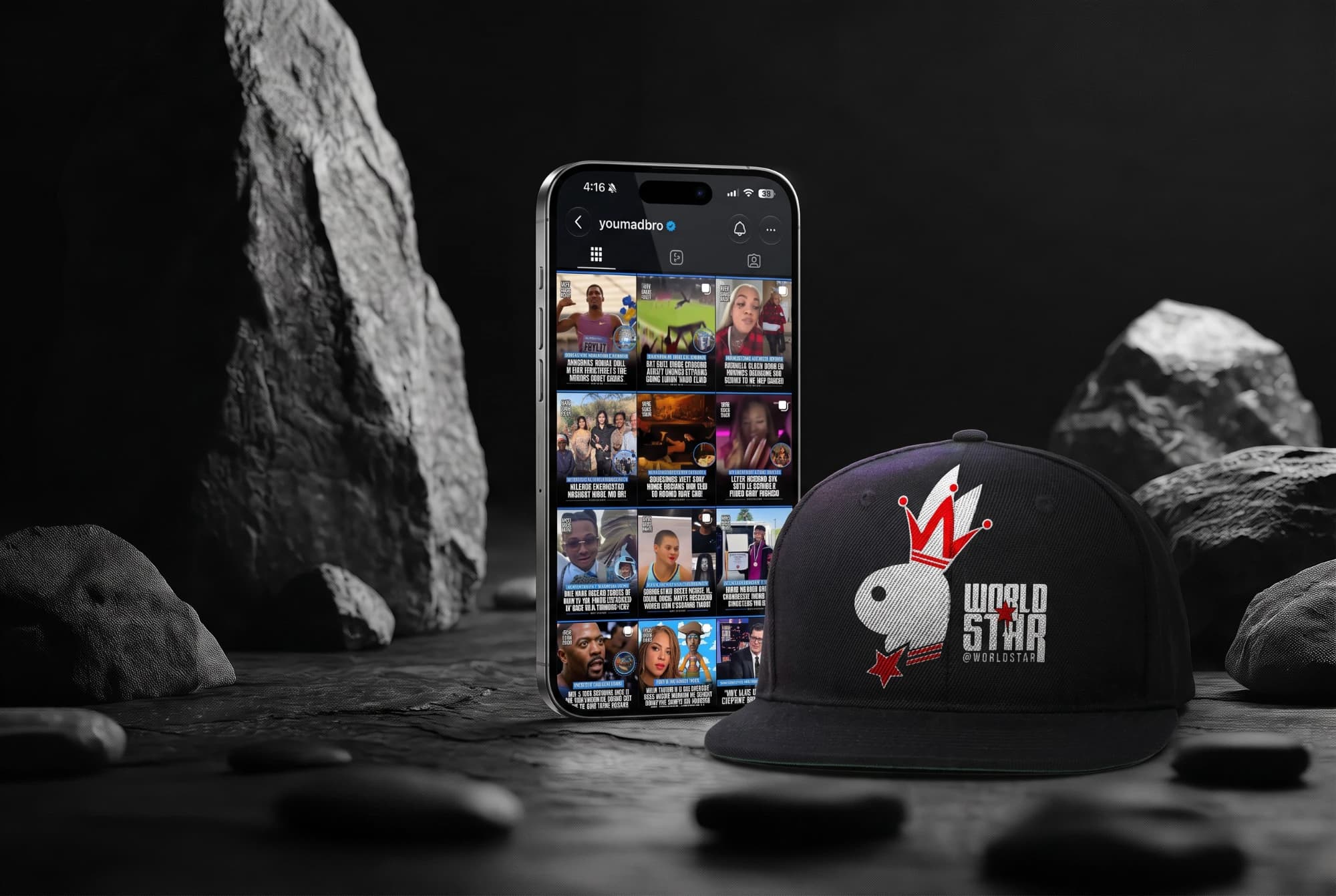 The YouMadBro Instagram profile on a phone, next to a special edition Worldstar cap